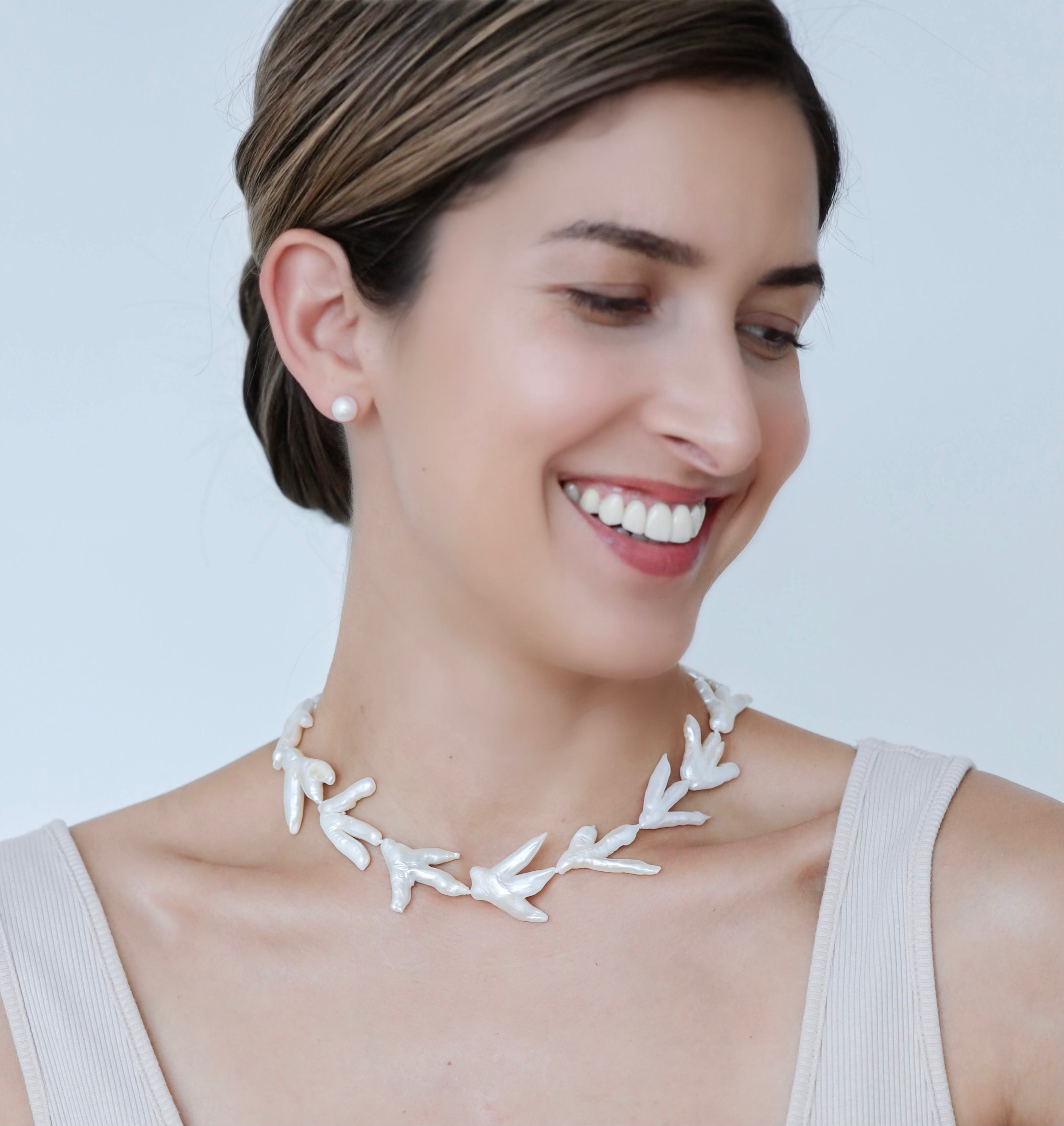 White woman wearing Akoya Classic Earrings